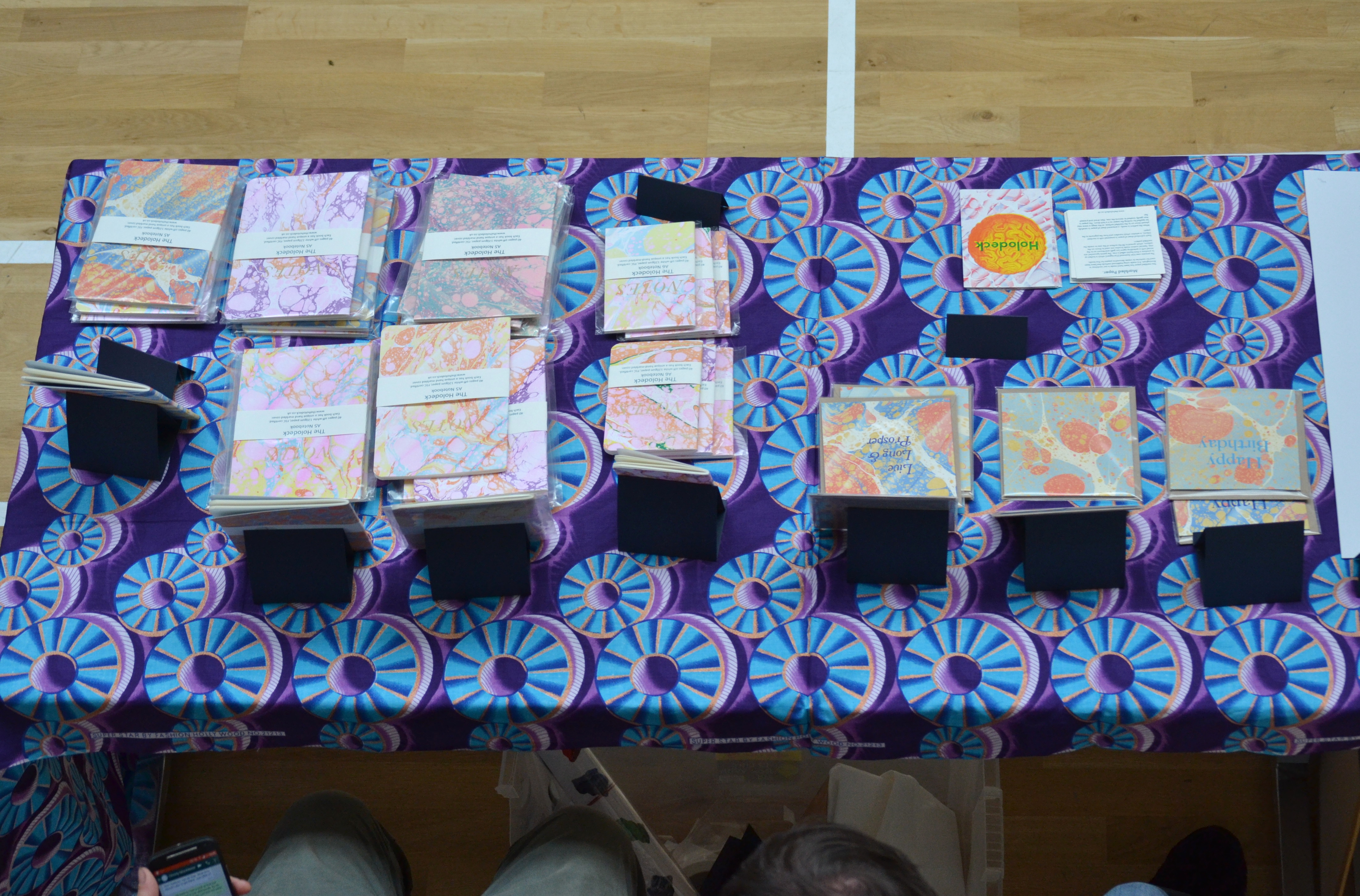 Looking down on the Holodeck stall with marbled paper products