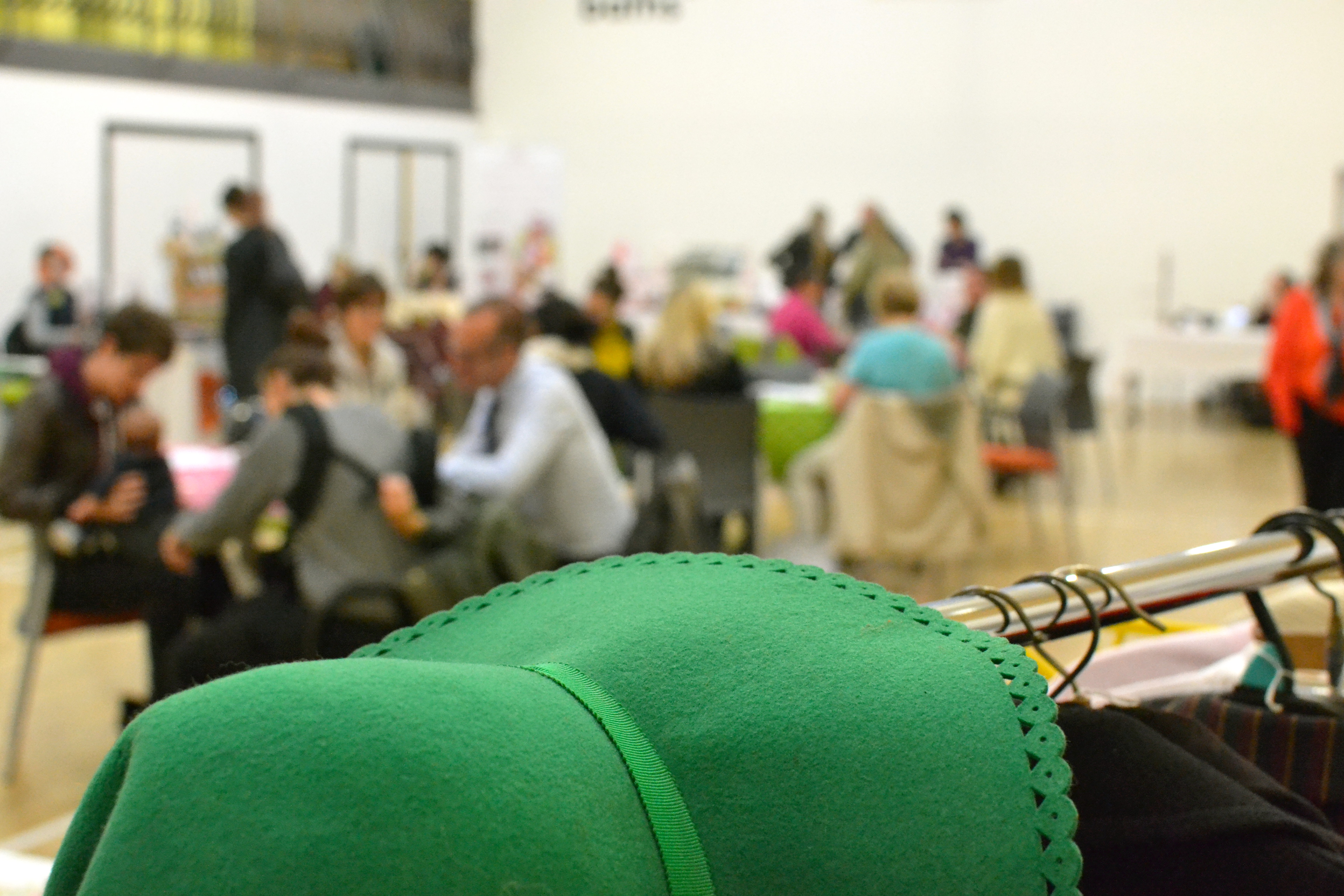 The main hall viewed from behind a vintage hat