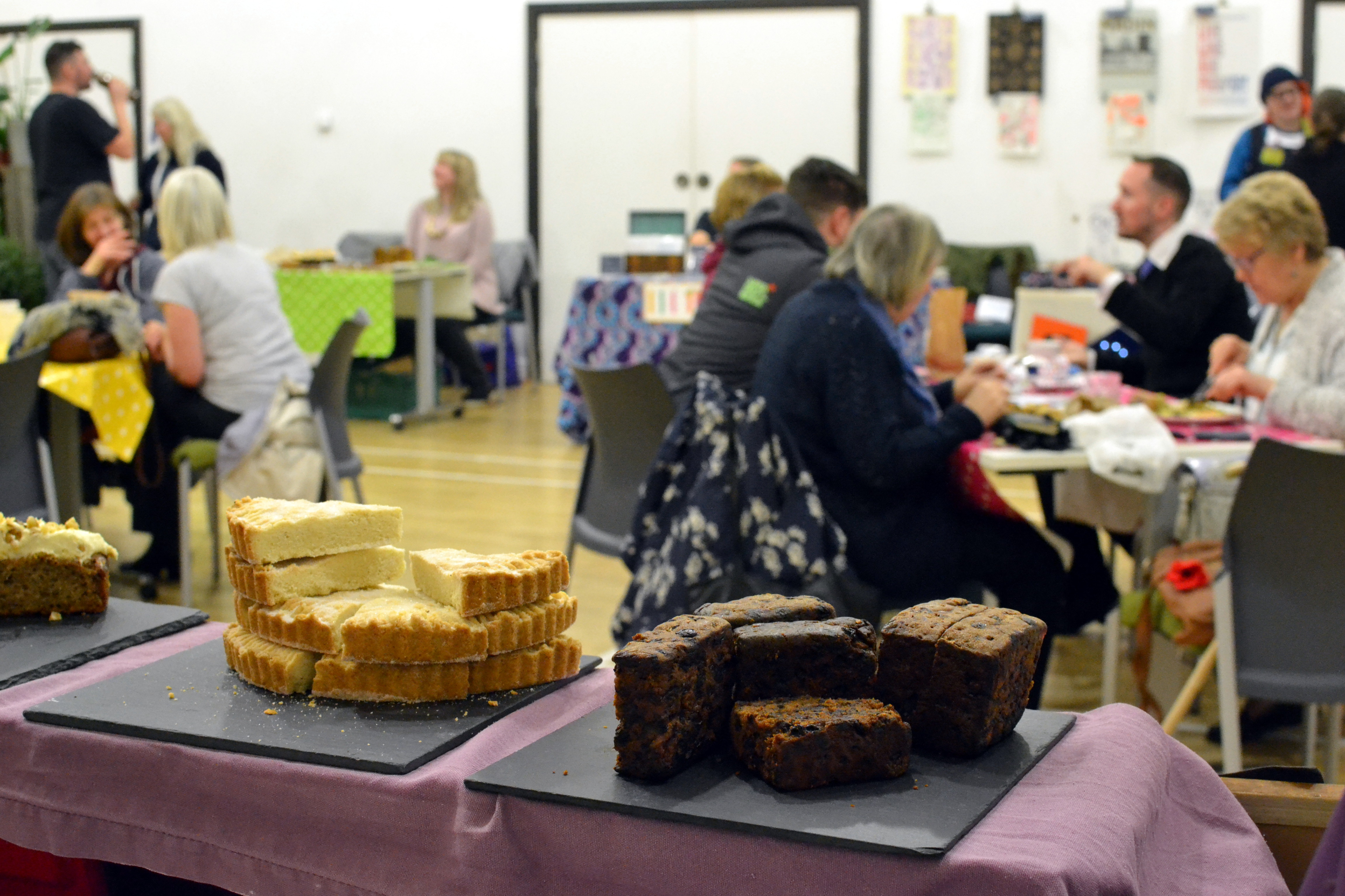Customers eating and socialising at tables
