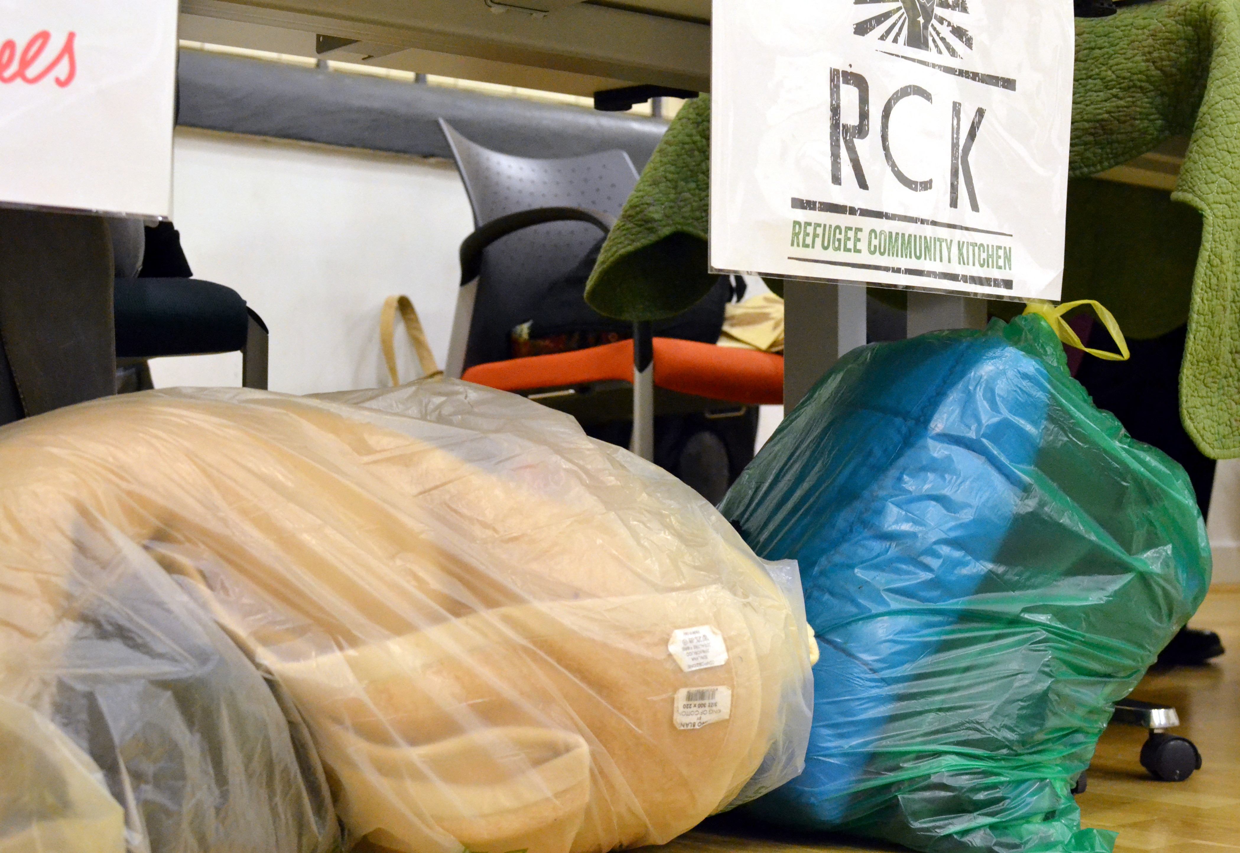 Bags of clothes and bedding