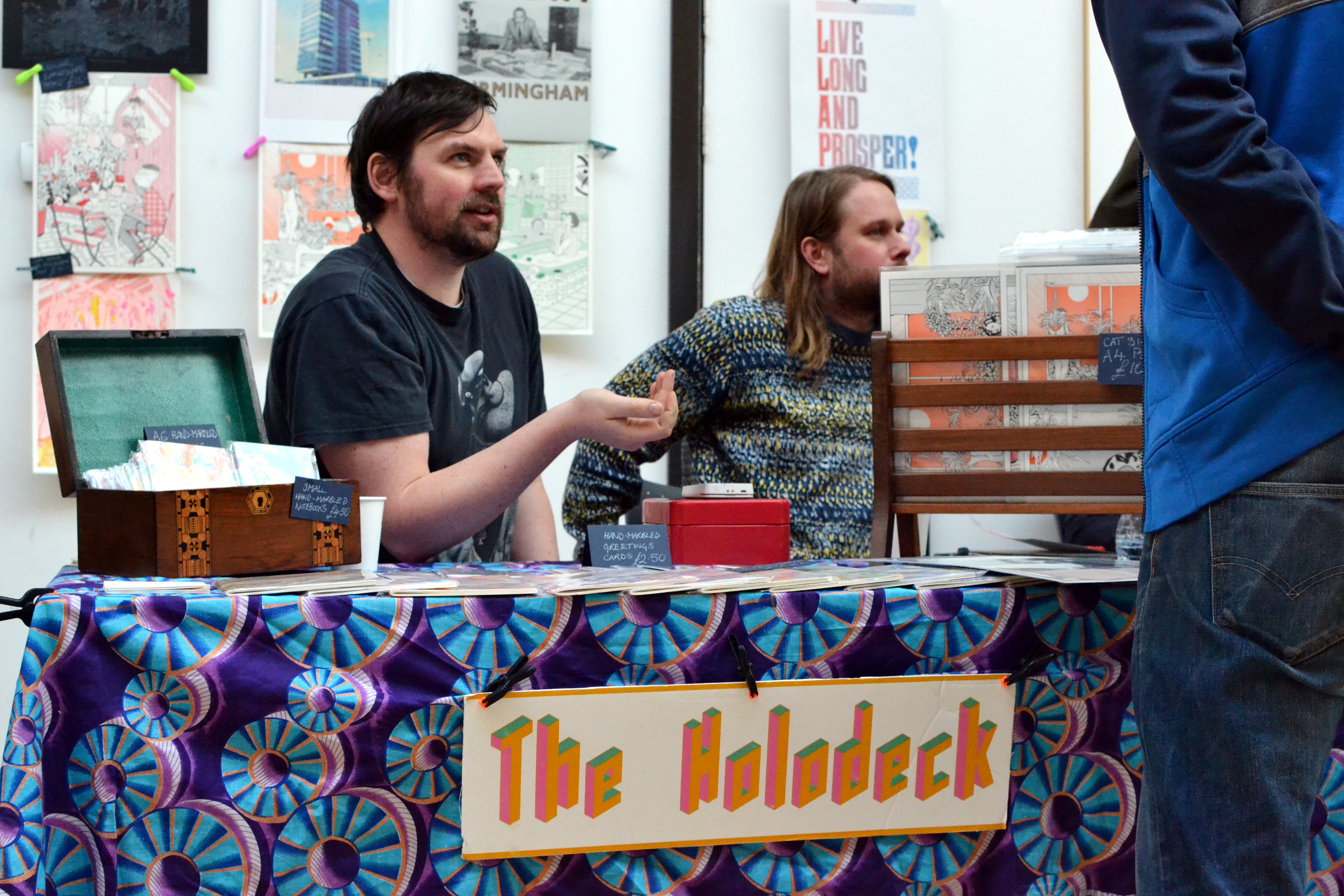 Holodeck with cards, notebooks and prints
