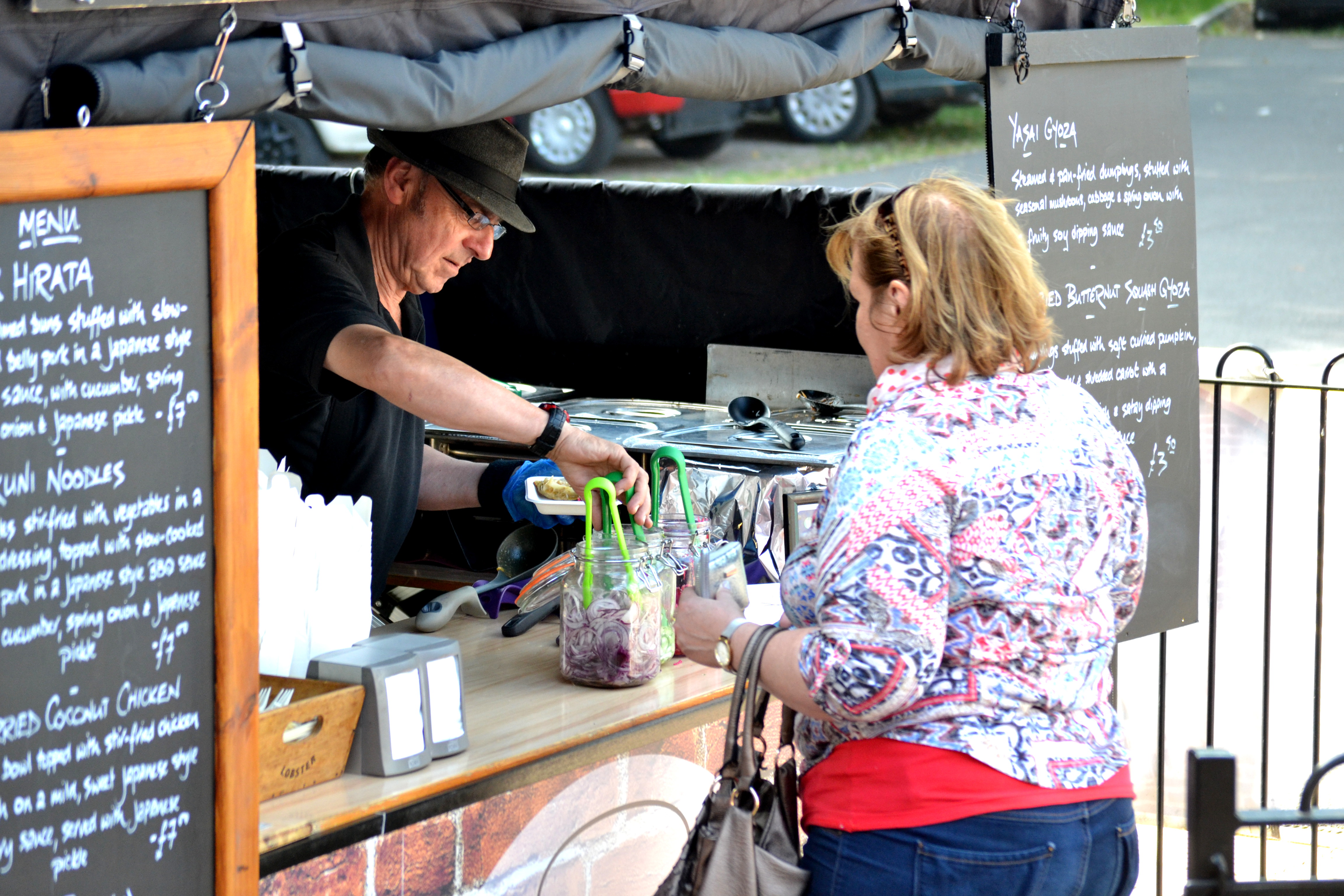 Serving a customer at Greshko Bodhi