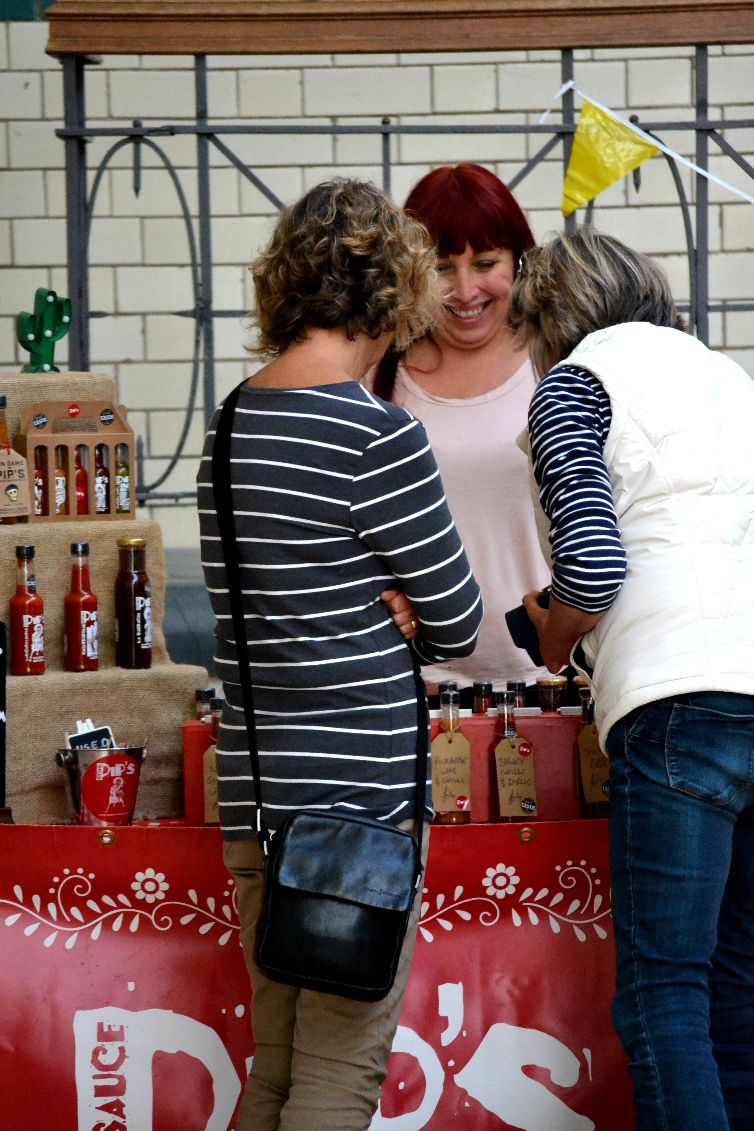 Customers at the Pip's Hot Sauce stall